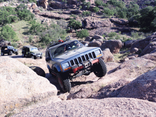 an-xj-crawling-up-a-granite-face