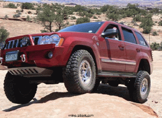 russ-livingston-in-his-highly-modified-wk-grand-cherokee