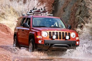 Mopar revealed the Jeep Patriot Extreme image vehicle at the 44th annual Easter Jeep Safari in Moab, Utah.  Mopar started with a Sunburst Orange Jeep Patriot model equipped with the Trail-rated off-road package and added a 2-inch Rocky Road Outfitters suspension lift, TJ ‘Moab’ 16-inch wheels, and BF Goodrich KM2 tires.  Additional protection is added to the front and rear fascias with custom rock rails.  Mopar added heavy-duty slush mats, Kicker audio and a roof-mounted snowboard carrier.