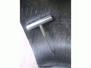 making-holes-to-stitch-the-tire