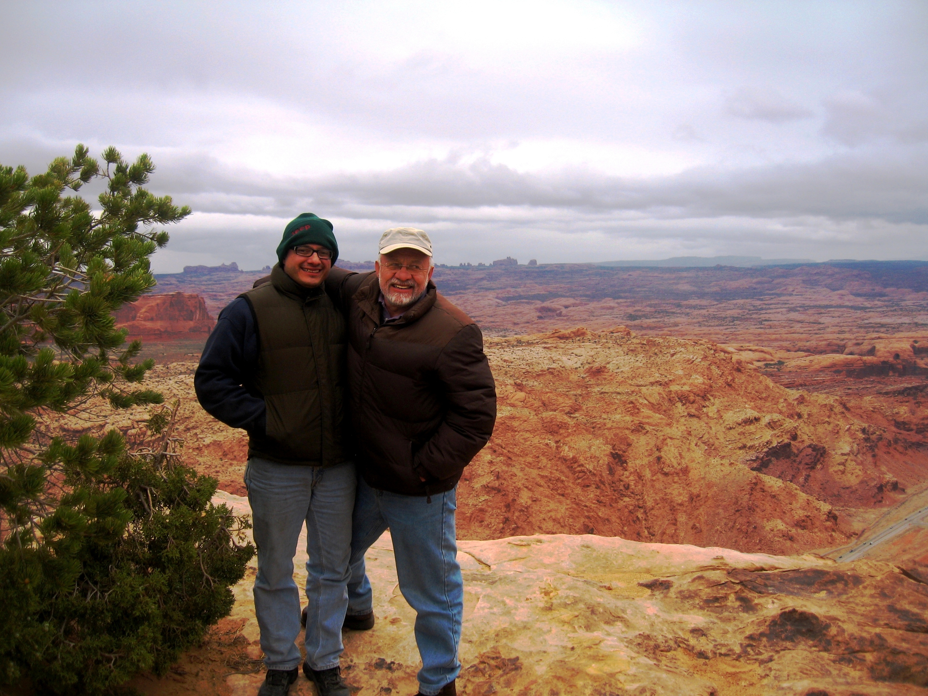 Dad & Son Overlooking Rim and 191 to the East