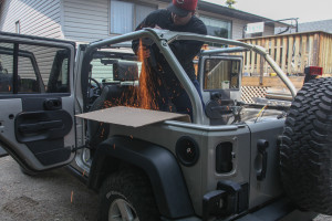 My friend Reg cutting the roll bar