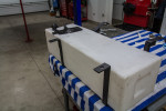 Straps made and fitted to tank, lined with foam weather sealing